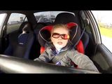 3 year old driving a Mitsubishi Lancer Evo