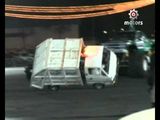 Garbage truck drifting in two wheels
