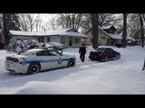 Subaru WRX pulls out stuck Police Officer